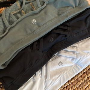Lot of 3 Athleta sports jog bras excellent condition. Size M
